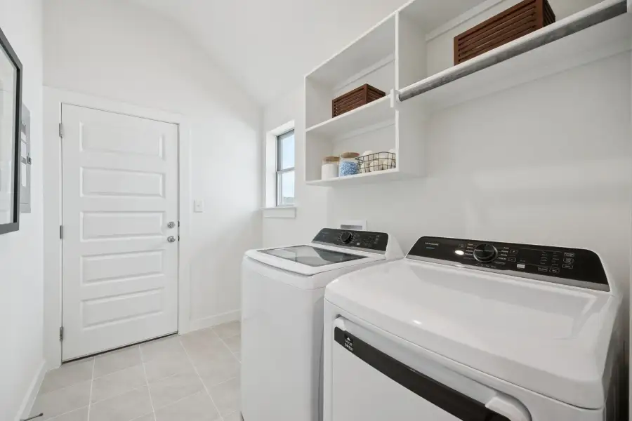 Utility Room in the Diamond home plan by Trophy Signature Homes – REPRESENTATIVE PHOTO