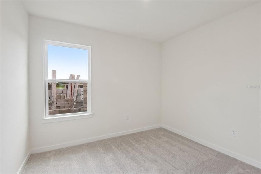 Spacious, unfurnished interior of a new home in Grasslands West, Lakeland (Image 15).