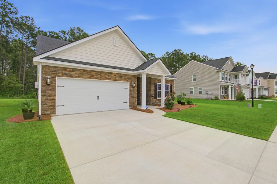 Front exterior of a new home in , Moncks Corner, SC, highlighting curb appeal (Image 27). Front exterior of a new home in , Moncks Corner, SC, highlighting curb appeal (Image 27).