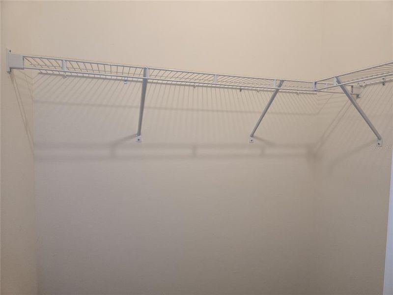 1 of 2 Primary walk-in closet