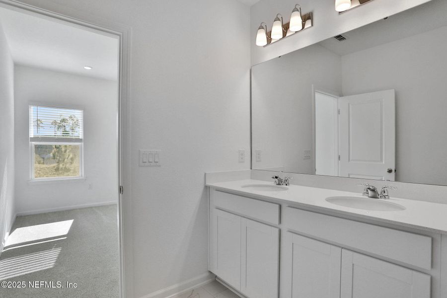 Furnished interior view inside a new home in Brook Forest - Townhomes, St. Augustine (Image 17).