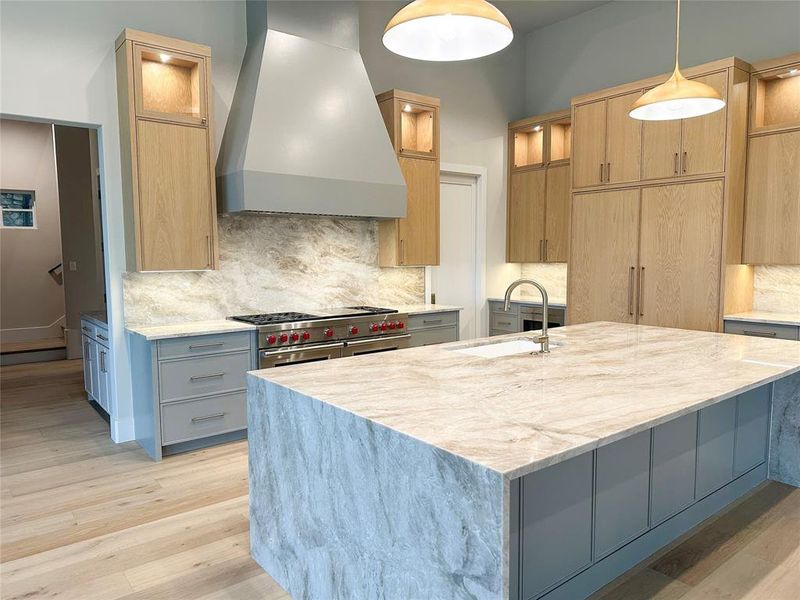 Another kitchen angle. See paneled Subzero refrigator and large Wolf Range.