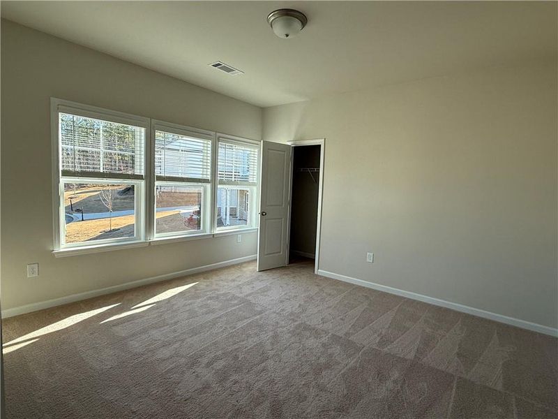 Spacious, unfurnished interior of a new home in River Rock, Ball Ground (Image 40).