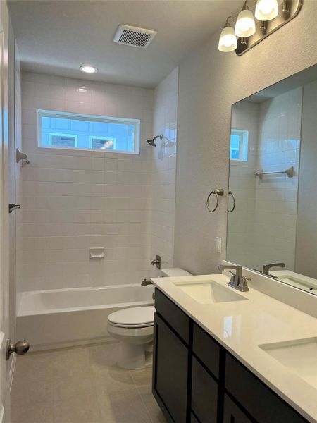 Furnished interior view inside a new home in Fleetwood, Dripping Springs (Image 8). Furnished interior view inside a new home in Fleetwood, Dripping Springs (Image 8).