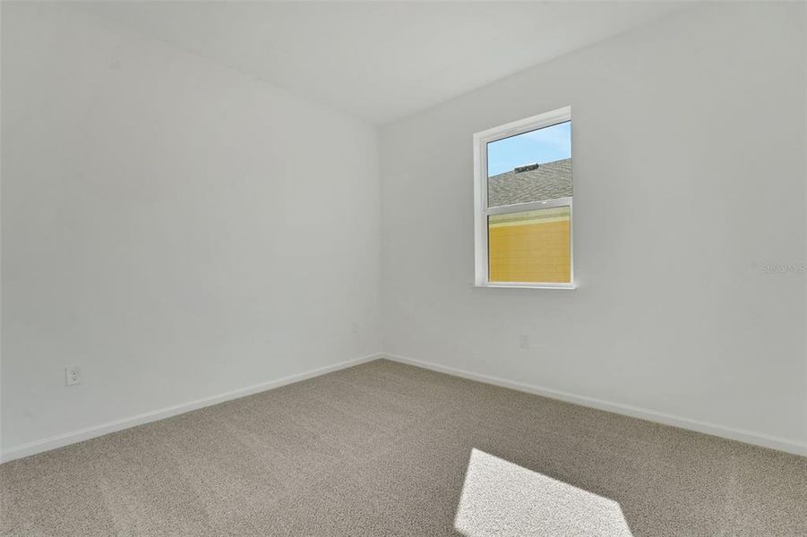 Spacious, unfurnished interior of a new home in Green Key Village, Lady Lake (Image 27).