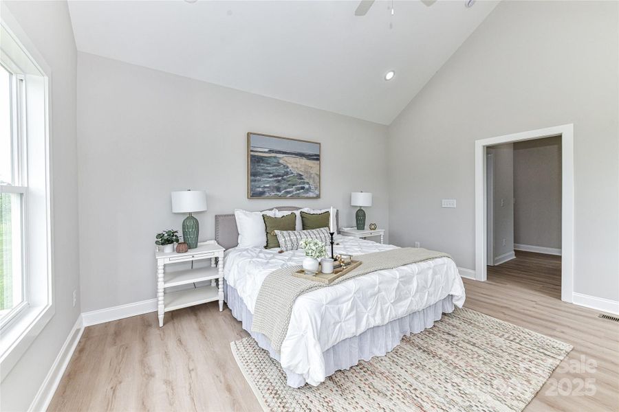 Spacious, Vaulted, Primary Suite on main level with ceiling fan/light, private bath & his & hers walk in closets! Spacious, Vaulted, Primary Suite on main level with ceiling fan/light, private bath & his & hers walk in closets!