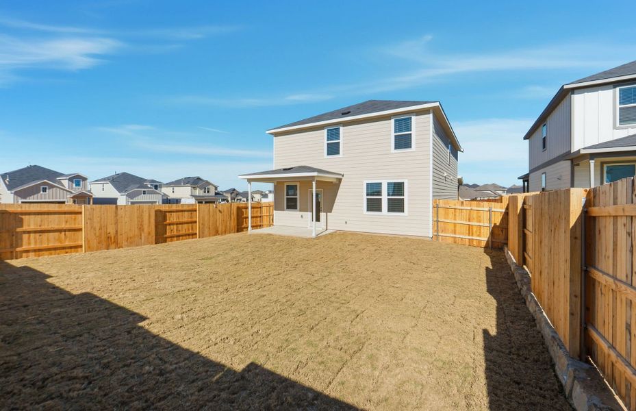 Exterior details and patio area of a home in Sunfield, Buda (Image 29).