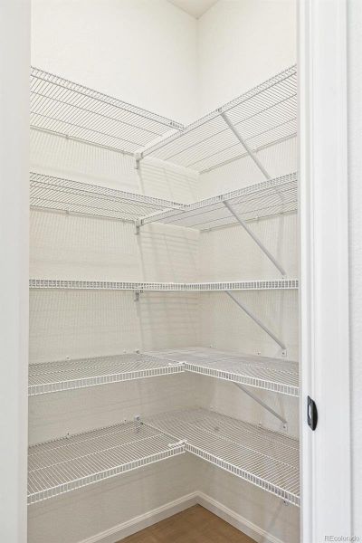 Spacious, unfurnished interior of a new home in Terrain Oak Valley, Castle Rock (Image 34).