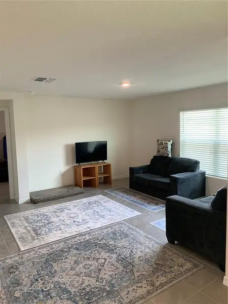 Furnished interior view inside a new home in Sunset Hills, Summerfield (Image 3).
