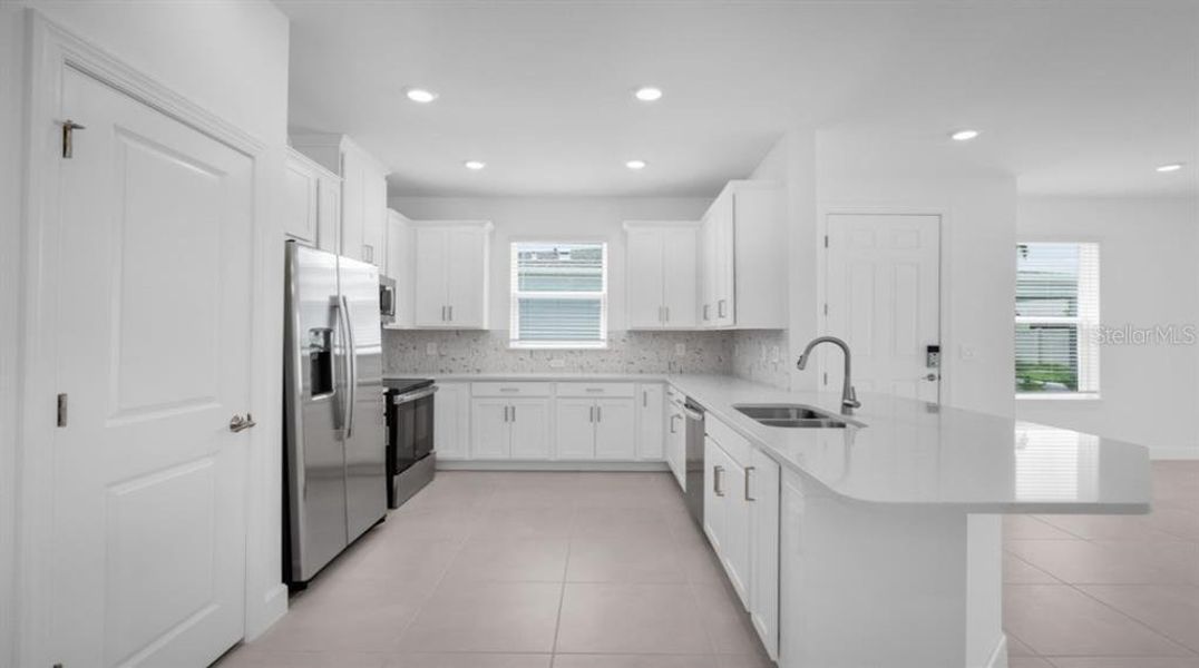 Furnished interior view inside a new home in The Cove at West Port, Port Charlotte (Image 5).