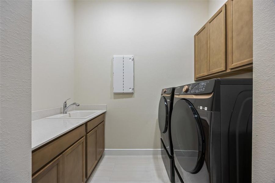 Furnished interior view inside a new home in Del Webb Sunbridge, St. Cloud (Image 19).