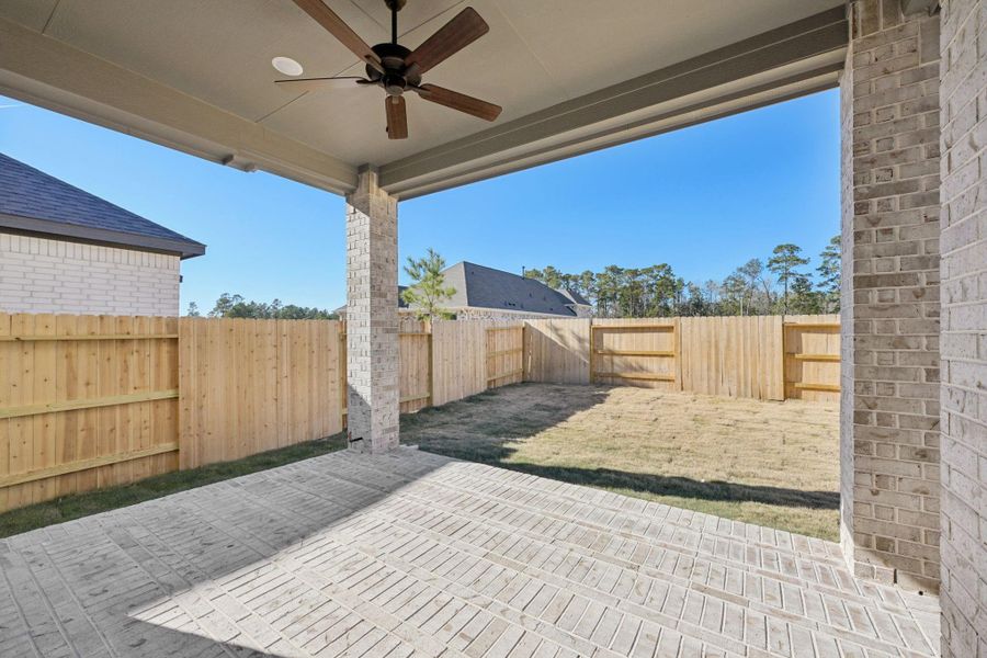 Exterior details and patio area of a home in Evergreen, Conroe (Image 17).
