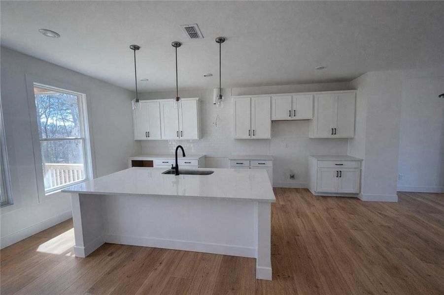 Furnished interior view inside a new home in , Suwanee (Image 2). Furnished interior view inside a new home in , Suwanee (Image 2).