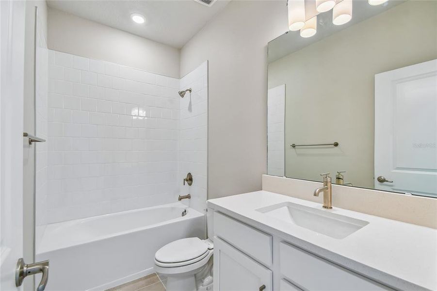 Furnished interior view inside a new home in Oakfield at Mount Dora Cottage Series, Mount Dora (Image 12).
