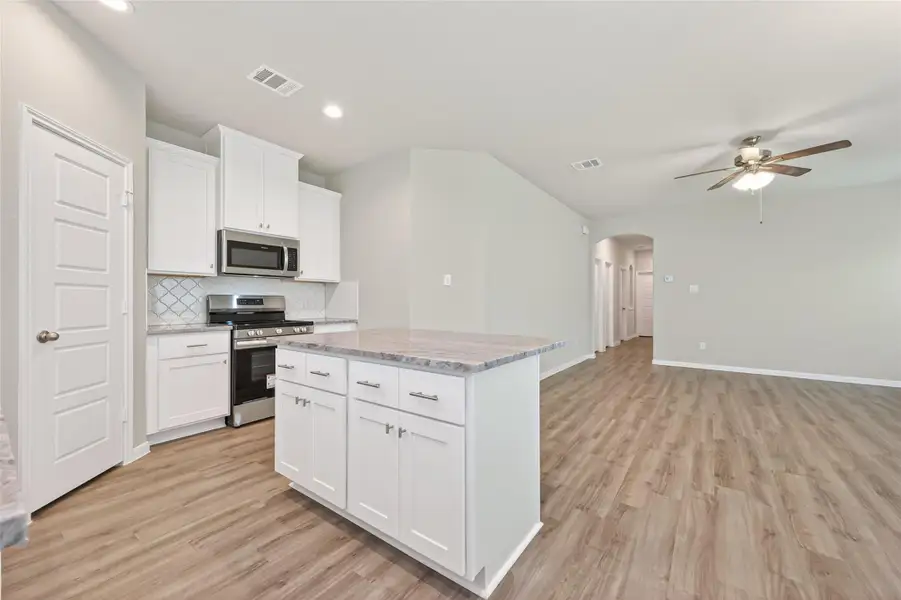 Furnished interior view inside a new home in Woodland Lakes, Houston (Image 6).
