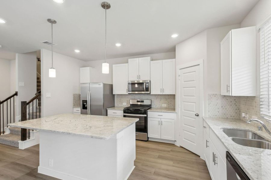 Photo is not of the actual home, but is an inspirational photo of builder’s model home and may depict options, furnishings, and/or decorator features that are not included