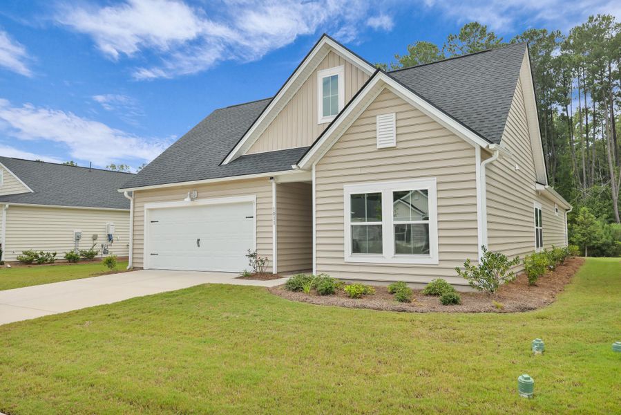 Front exterior of a new home in , Summerville, SC, highlighting curb appeal (Image 1).