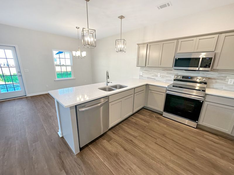 Furnished interior view inside a new home in Tranquil South, Hinesville (Image 7).