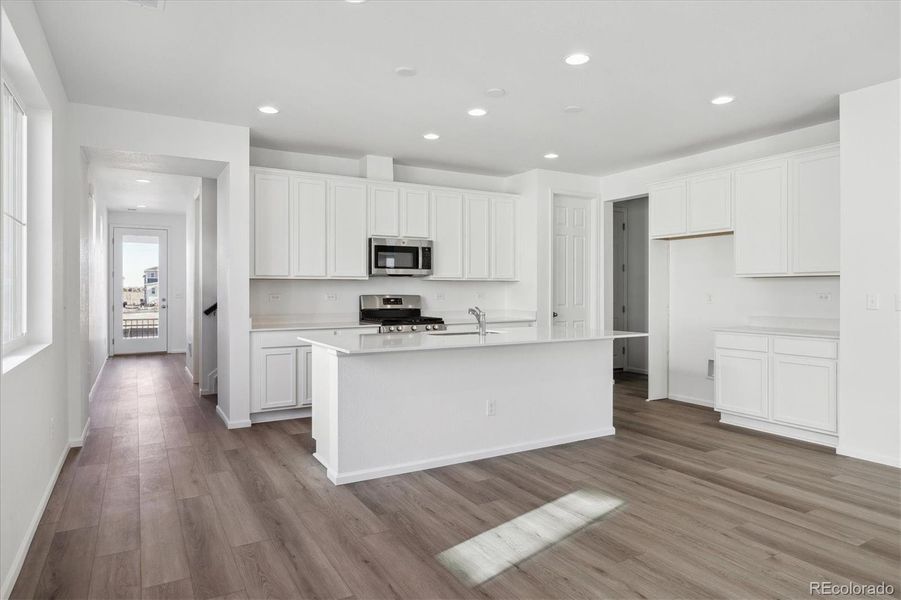 Furnished interior view inside a new home in Skyview at High Point, Aurora (Image 9).