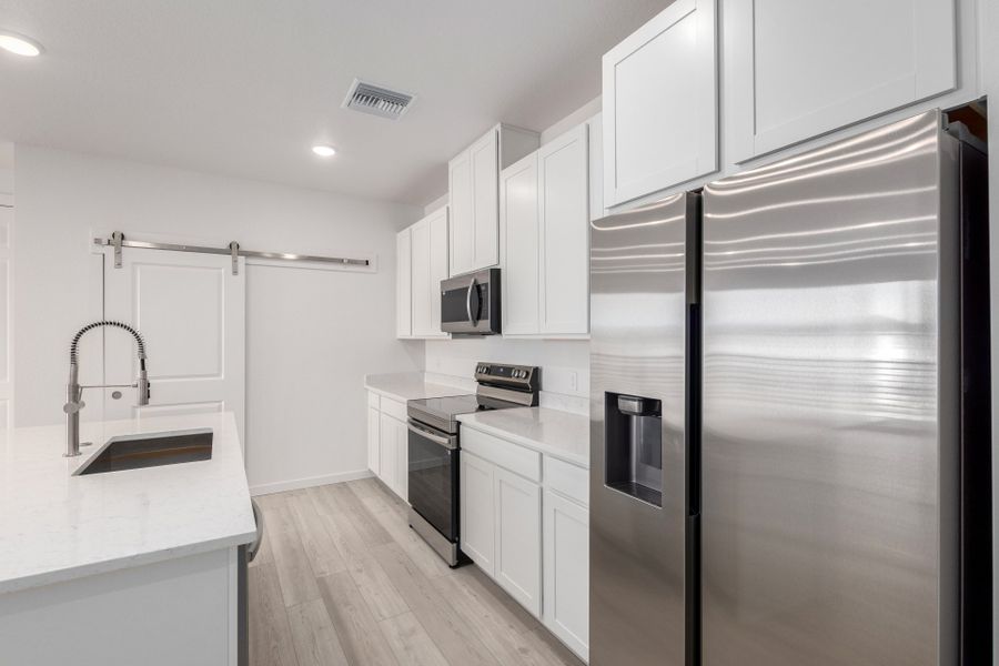 Furnished interior view inside a new home in Gateway Commons, Denver (Image 5).