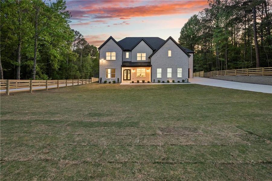 Front exterior of a new home in , Lawrenceville, GA, highlighting curb appeal (Image 25). Front exterior of a new home in , Lawrenceville, GA, highlighting curb appeal (Image 25).