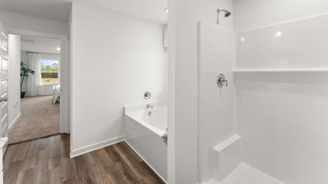 Furnished interior view inside a new home in Magnolia at the Bluffs Phase 3, Freeport (Image 25).