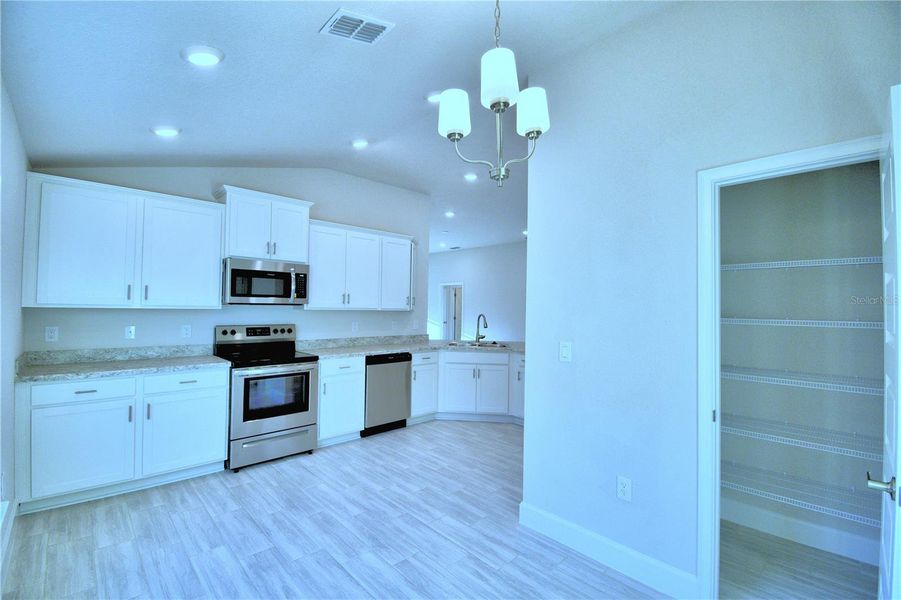 Furnished interior view inside a new home in Magnolia Park, Haines City (Image 5).