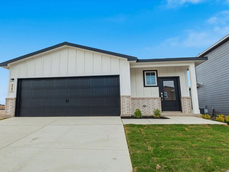 Front exterior of a new home in Agave, San Antonio, TX, highlighting curb appeal (Image 2). Front exterior of a new home in Agave, San Antonio, TX, highlighting curb appeal (Image 2).