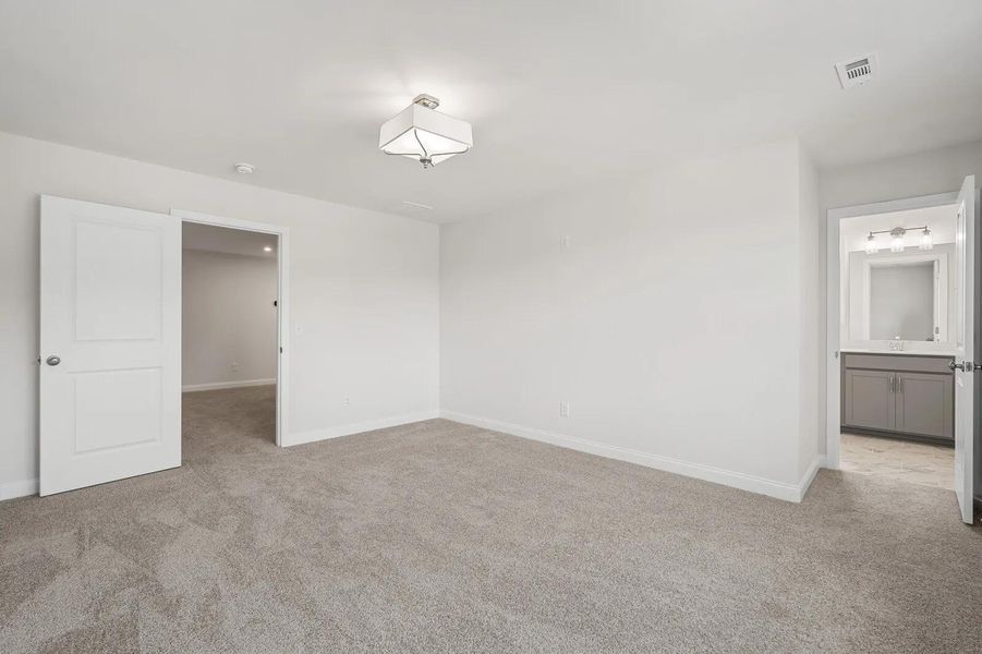 The Beverly B Primary Suite Bedroom