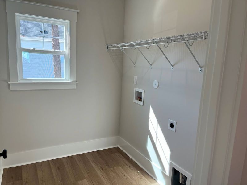 Spacious, unfurnished interior of a new home in Osprey Landing, Southport (Image 14).