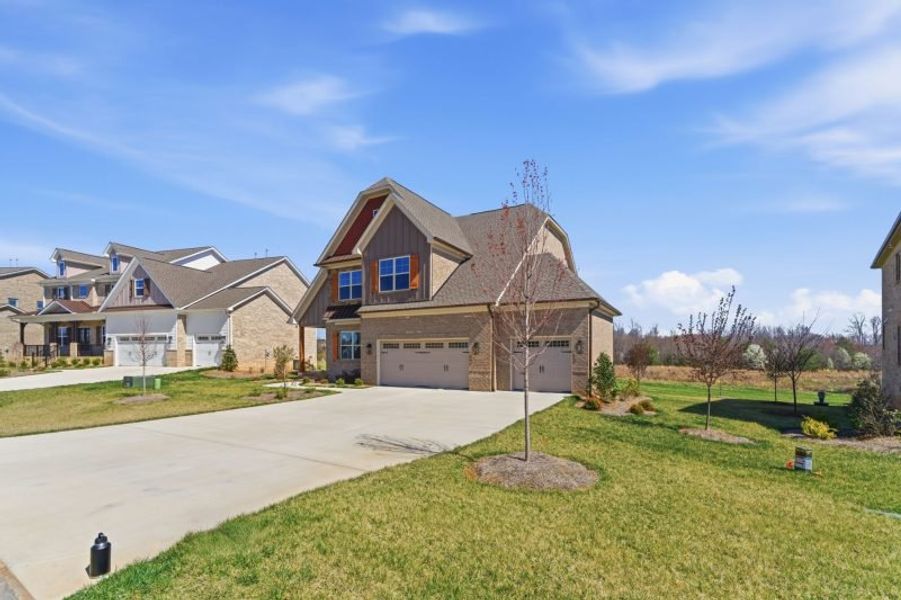 Representative exterior photo of a completed home built from the Hampton by Keystone Homes NC in Preserve at Carriage Cove, Oak Ridge, NC (Image 41).