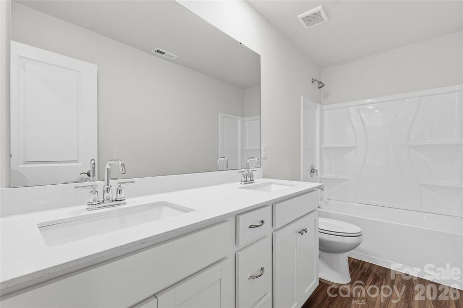 Furnished interior view inside a new home in Redhawk: Enclave, Belmont (Image 7).