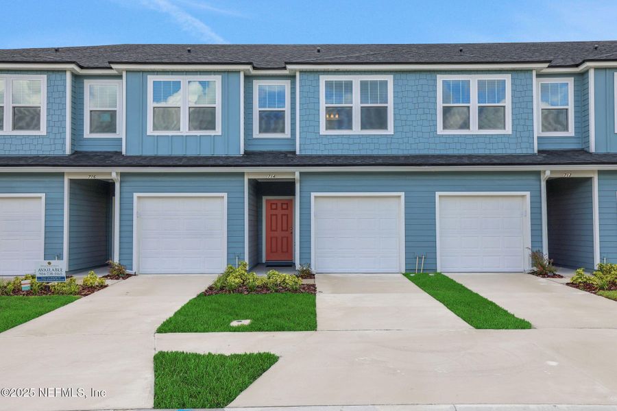 Front exterior of a new home in Kasen Oaks, Jacksonville, FL, highlighting curb appeal (Image 19).