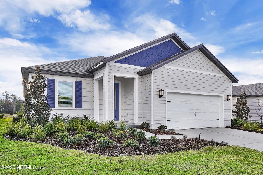 Front exterior of a new home in Jennings Farm, Middleburg, FL, highlighting curb appeal (Image 2). Front exterior of a new home in Jennings Farm, Middleburg, FL, highlighting curb appeal (Image 2).