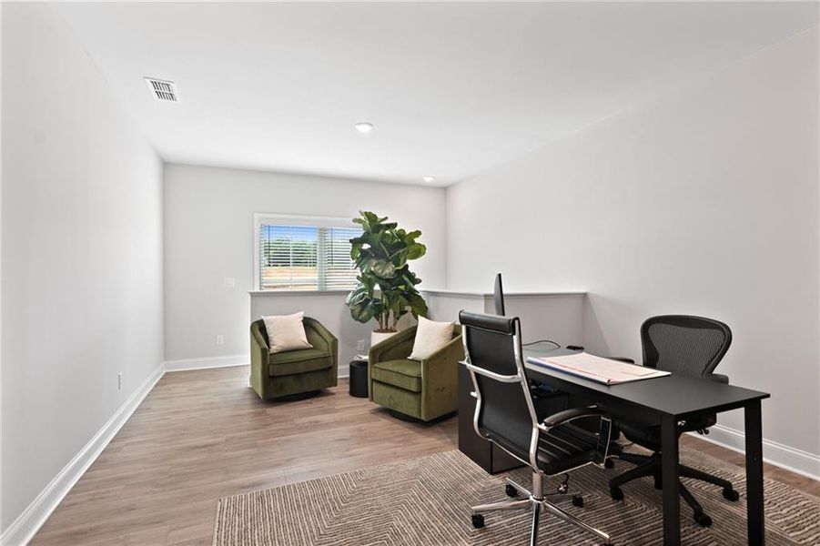 Furnished interior view inside a new home in Promenade at Sawnee Village, Cumming (Image 6).