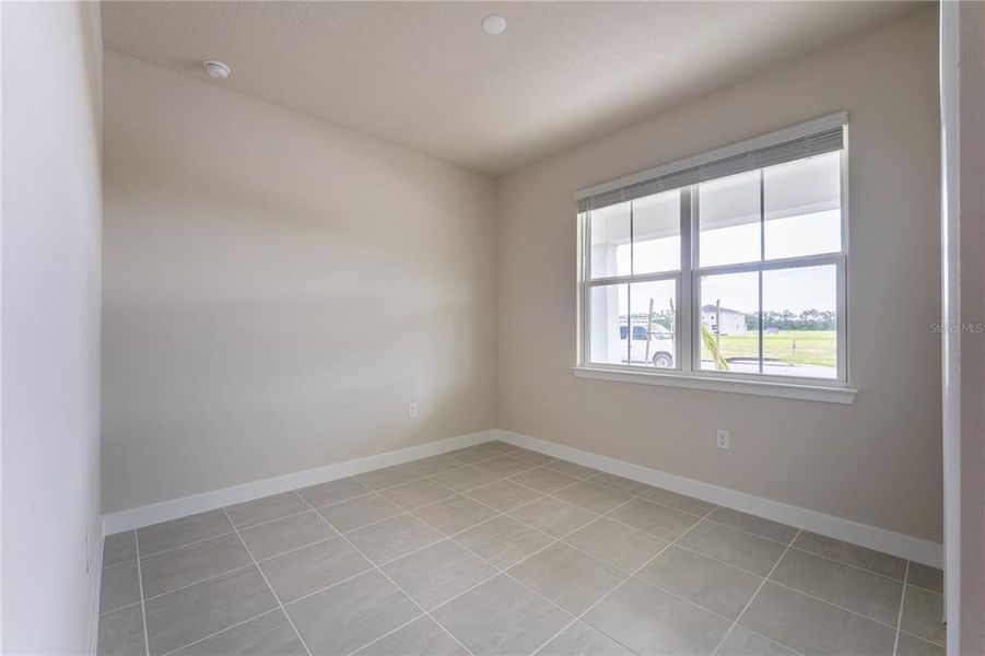 Spacious, unfurnished interior of a new home in The Palms at Venetian Bay, New Smyrna Beach (Image 17).