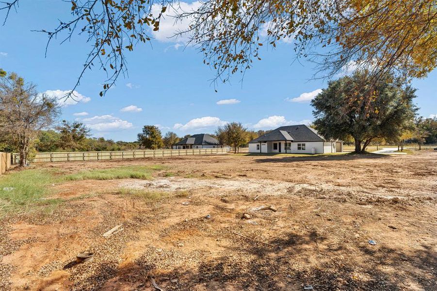 View of yard with a view of rural / pastoral area
