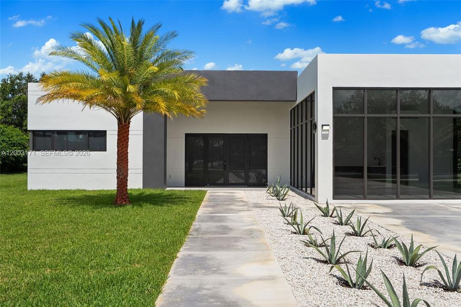 Front exterior of a new home in , Homestead, FL, highlighting curb appeal (Image 20).