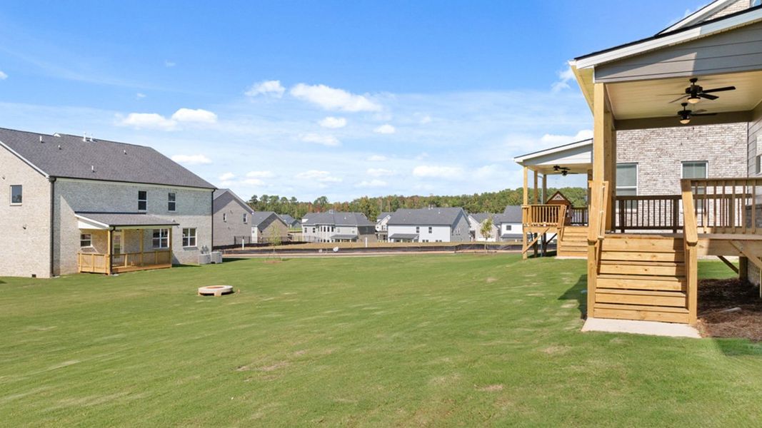 Front exterior of a new home in Heritage Pointe, Senoia, GA, highlighting curb appeal (Image 29). Front exterior of a new home in Heritage Pointe, Senoia, GA, highlighting curb appeal (Image 29).