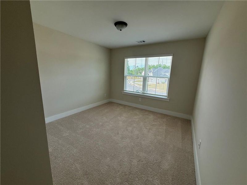 Spacious, unfurnished interior of a new home in Rose Creek, Cumming (Image 11).