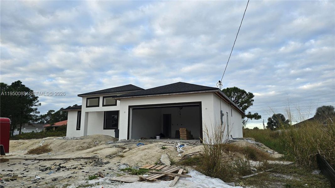In-progress construction of a new home in , Lehigh Acres, FL (Image 24).