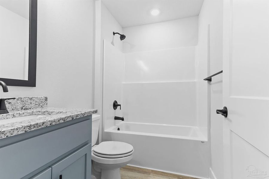 Furnished interior view inside a new home in Pecan Valley, Pensacola (Image 7).