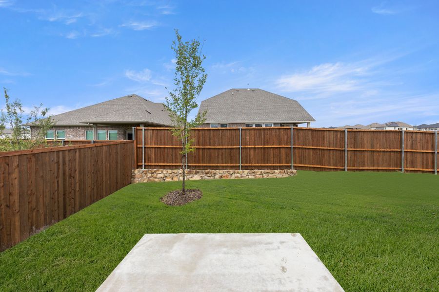 Exterior details and patio area of a home in Creekside, Royse City (Image 2).