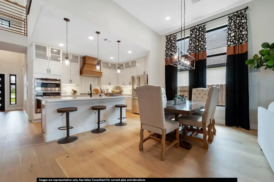 Dining room featuring healthy amount of natural light, light wood-style floors, and recessed lighting Dining room featuring healthy amount of natural light, light wood-style floors, and recessed lighting