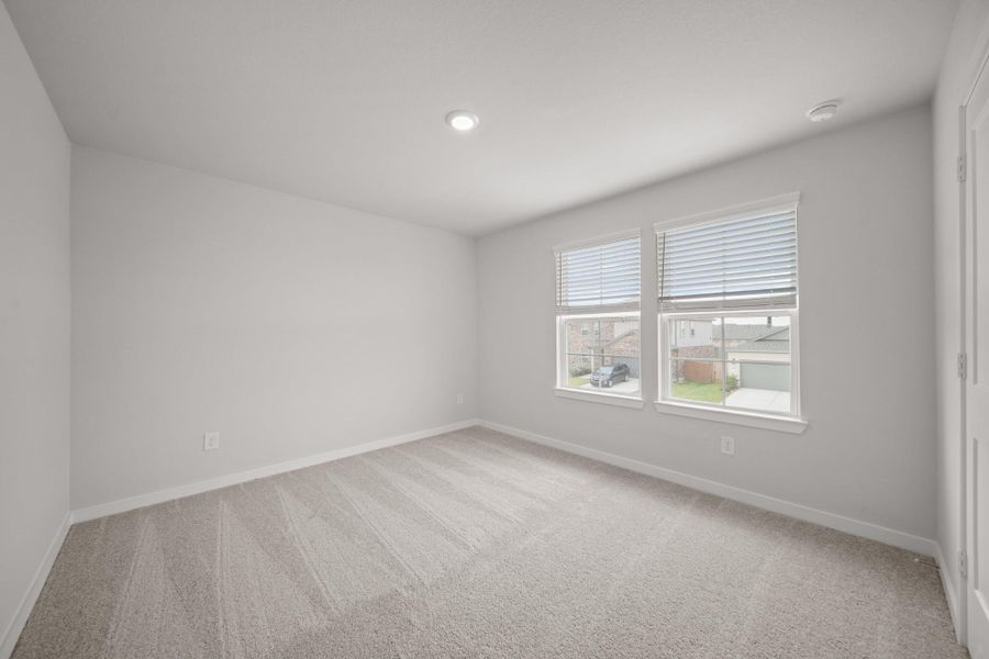 Spacious, unfurnished interior of a new home in Sunterra, Katy (Image 26).