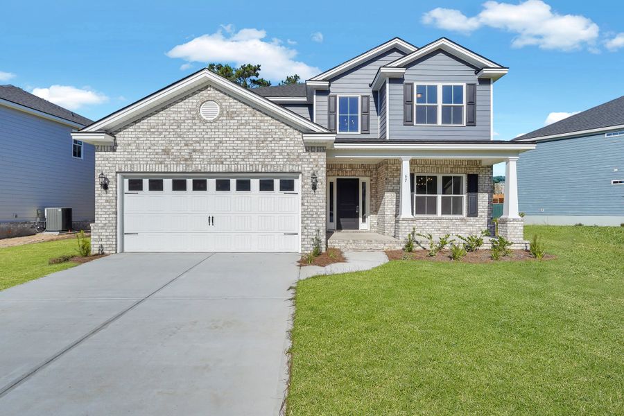 Representative exterior photo of a completed home built from the Kingston by Ernest Homes in Wexford, Richmond Hill, GA (Image 30).