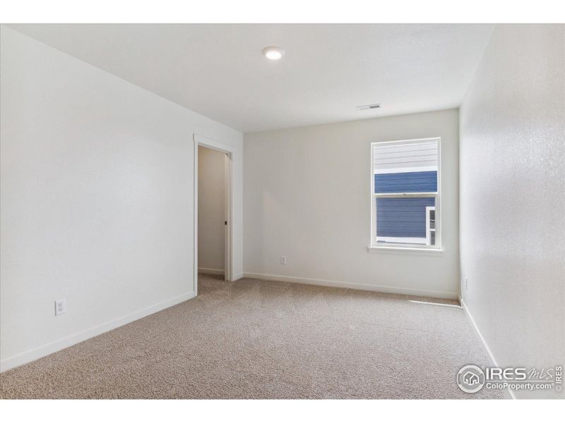 Spacious, unfurnished interior of a new home in Silver Peaks, Lochbuie (Image 19).
