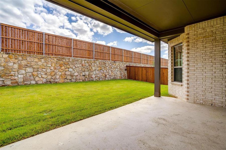 View of yard with a patio area