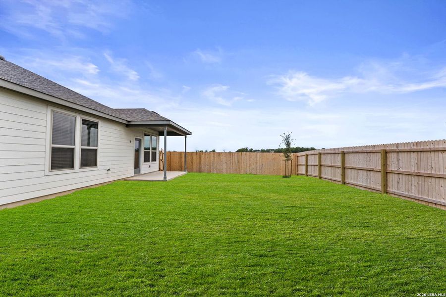 Exterior details and patio area of a home in Dove Song, Marion (Image 3).