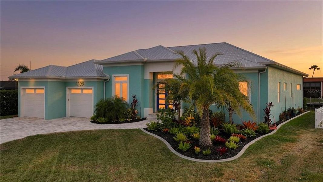 Front exterior of a new home in , Punta Gorda, FL, highlighting curb appeal (Image 22).